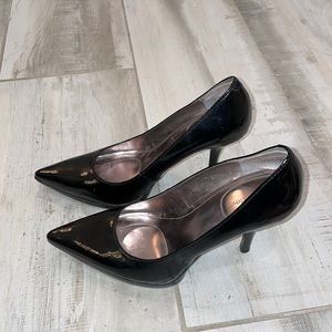 Black Calvin Klein pumps